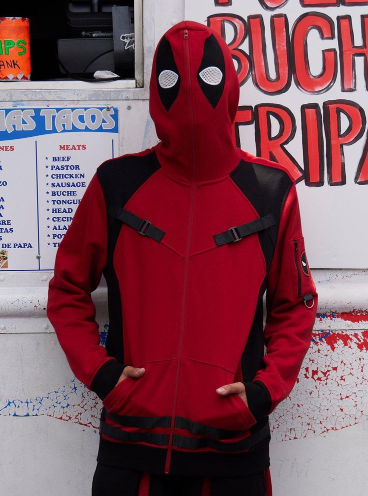 The best part of this hoodie? It's not green or animated! Rep the Merc with a Mouth in this Deadpool & Wolverine hoodie! Inspired by Deadpool's costume  this zip-up features black and red color-blocking. Comes with utility straps on the chest and along the hem  plus a Deadpool zipper pocket on the right sleeve. You can zip the hoodie up to the top  allowing you to wear the hood as a mask. Complete with front pockets and mesh eyeholes. Wear it with the matching joggers to give your look maximum effort! Trending Halloween Costumes, Marvel Items, Deadpool Costume, Wolverine Deadpool, Maximum Effort, Pop Culture Outfits, Culture Outfits, Her Universe, Deadpool Wolverine