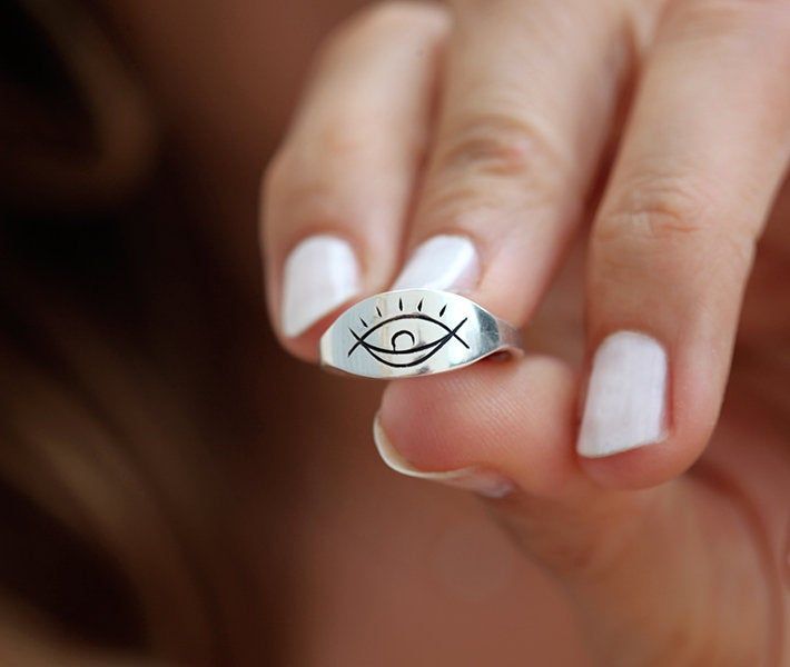 Silver boho ring, simple eye ring. Universe or adinkra ring. Shiny wide bohemian band. Please, see similar designs here: https://www.etsy.com/listing/614934464/silver-lotus-flower-ring-boho-yoga-ring https://www.etsy.com/listing/614933774/silver-moon-phase-ring-boho-ring ★Details Band measurements: approx. 5-6mm wide at the front, 2mm at the back Material: sterling silver, yellow/rose gold vermeil, 14k/18k yelow/white/rose solid gold Size: 3-8 (Larger and smaller sizes are available per request. Symbolic Sterling Silver Signet Ring For Wedding, Wedding Symbolic Sterling Silver Signet Ring, Symbolic Hand Forged Engraved Ring As Gift, Symbolic Hand Forged Engraved Ring For Gift, Symbolic Hand-forged Engraved Ring As A Gift, Symbolic Evil Eye Jewelry Ring, Symbolic Evil Eye Ring Jewelry, Symbolic Hand Forged Signet Ring As Gift, Symbolic Hand Forged Sterling Silver Rings