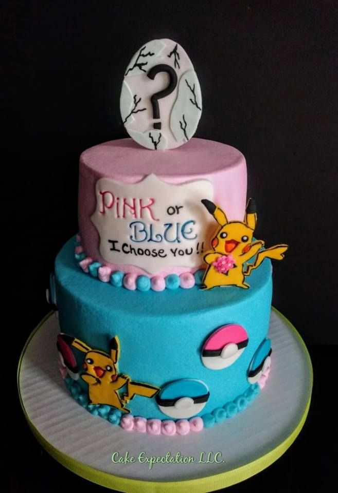 a birthday cake with the number one on top and pokemon characters painted on the side