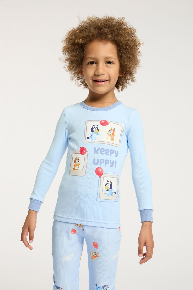 MILO LONG SLEEVE PYJAMA SET LICENSE Playful Blue Crew Neck Sets, Cute Blue Sleepwear With Character Print, Blue Crew Neck Sets For Sleepover, Cute Blue Character Print Sleepwear, Playful Cartoon Print Sleep Tops, Cute Blue Long Sleeve Sleepwear, Playful Long Sleeve Sleep Top, Blue Crew Neck Pajama Set For Pajama Party, Long Sleeve Cartoon Print Bedtime Tops