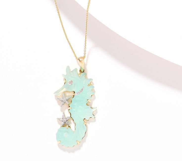 The beauty of the sea is captured with this carved gemstone seahorse necklace. Diamond accents add sparkle to an already stunning piece. From Glenn Lehrer Collection. Seahorse Necklace, Seahorse Pendant, Necklace Diamond, The Sea, The Beauty, Jewelry Necklaces, Carving, Sparkle, Yellow Gold