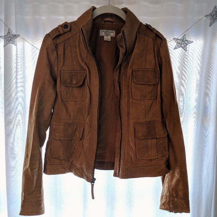 Excellent Used Condition Soft Camel Colored Leather, Zipper Sleeves, Four Functional Front Pockets Brown Utility Outerwear With Zipper Closure, Brown Biker Jacket With Flap Pockets For Fall, Brown Leather Utility Jacket For Fall, Fall Leather Utility Jacket With Long Sleeves, Leather Jacket With Multiple Pockets For Fall, Leather Utility Jacket With Long Sleeves For Fall, Fall Leather Outerwear With Multiple Pockets, Brown Utility Leather Jacket For Fall, Brown Fall Outerwear With Multiple Pockets