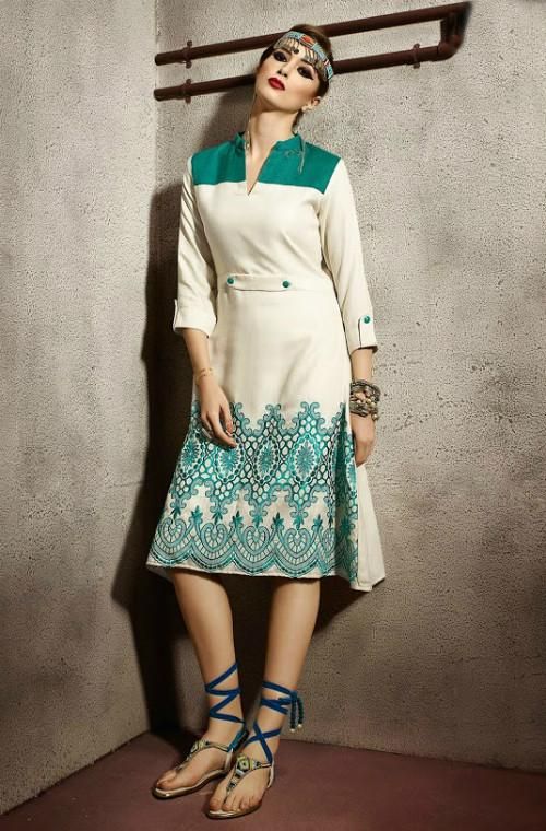 Our new winter collection features cream and green combination pashmina kurti adorned with delicate embroidery on the hem adding grace to the outfit. This unique design is a perfect ensemble for winter, not only keeping you warm but also making sure you look your very best all the time. Available as stitched (ready-to-wear). Note: There might be a slight color variation due to lighting and flash used during photoshoot. The bright shade seen is the best closer view of fabric's color. Elegant Green Kurta With Embroidered Border, White Embroidered Sleeves Straight Kurta, Designer Green Kurta With Embroidered Sleeves, Festive Straight Kurta With Embroidered Hem, Elegant Green Kurta With Embroidered Sleeves, Traditional Cotton Salwar Kameez With Embroidered Sleeves, Semi-stitched Kurta With Embroidered Sleeves, Elegant Festive Kurta With Embroidered Hem, Festive Eid Kurta With Embroidered Hem