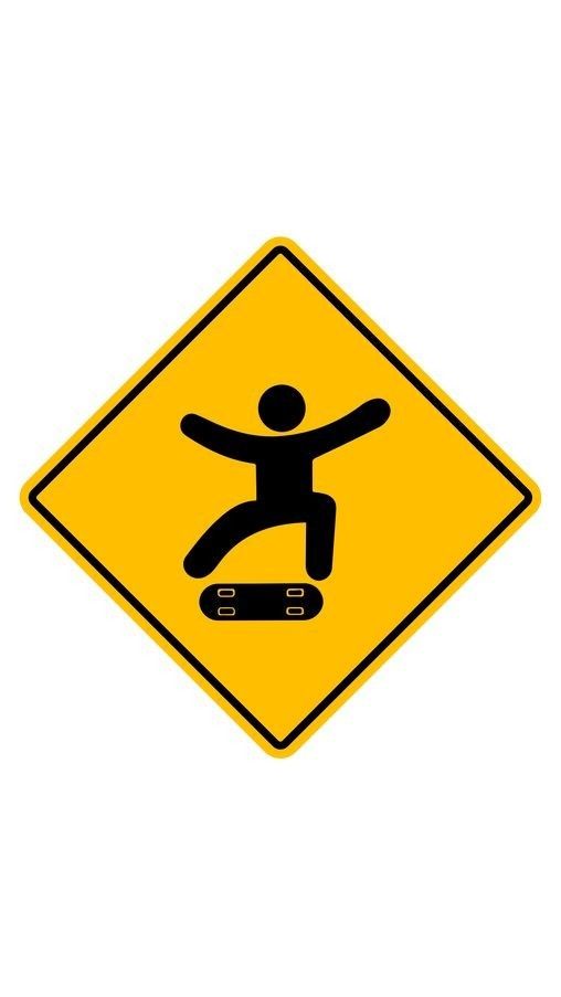 a yellow and black sign with a man on a skateboard in the middle of it