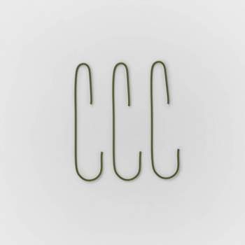 the letter c is made out of wire on a white background with green letters in it