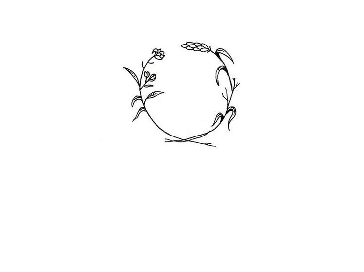 a black and white drawing of a circle with flowers