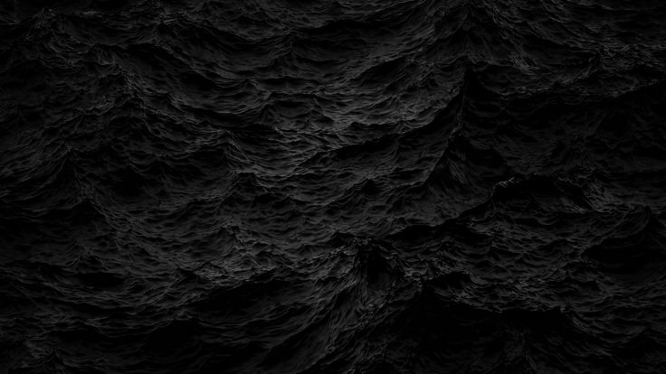 an abstract black and white photo with wavy lines in the dark, textured surface