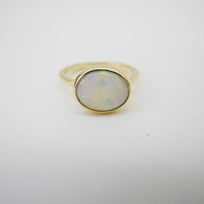 Opal Ring Elegant Polished Opal Open Ring, Elegant Opal Open Ring With Polished Finish, Modern Opal Ring In 14k Gold With Polished Finish, Modern 14k Gold Opal Ring With Polished Finish, Modern White 14k Gold Ring, Polished Yellow Gold Opal Ring, White Stackable Opal Jewelry, Elegant Oval Opal Ring With Polished Finish, Timeless White Stackable Jewelry