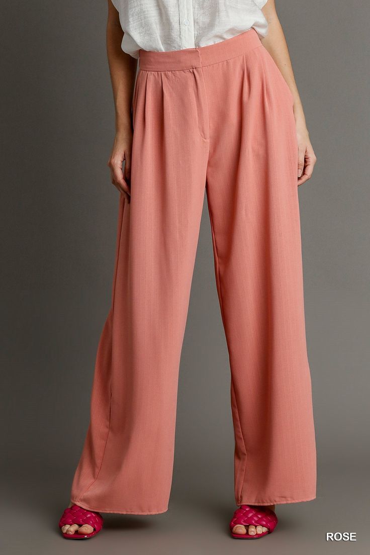 Description: The Elegance High-Waisted Wide Leg Trousers are the perfect blend of sophistication and comfort, designed to elevate your style for any occasion. Crafted from 100% polyester, these trousers feature a sleek, high-waisted fit that flatters the silhouette, while the wide leg design offers a flowing, elegant look. The trousers are adorned with classic trouser buttons and a secure garment hook closure for a tailored finish. The pleated details add a refined touch, enhancing the overall c Elegant High-waisted Pink Wide Leg Pants, Luxury Wide-leg Rayon Bottoms, Pink Tailored Wide-leg Bottoms, Pink Ankle-length Wide Leg Pants With Elastic Waistband, Non-stretch Full Length Pink Wide Leg Pants, Classic Trousers, Midi Maxi Dress, Wide Leg Trousers, Winter Collection