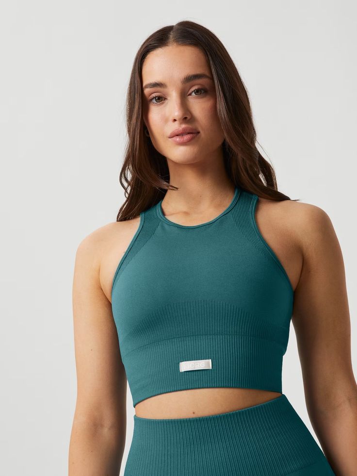 Studio Seamless Bralette - Mallard Blue | Björn Borg Green Ribbed Activewear For Gym, Green Ribbed Activewear For Sports, Seamless Gym Sportswear Crop Top, Ribbed Seamless Activewear For Yoga, Ribbed Seamless Yoga Activewear, Green Ribbed Sporty Activewear, Functional Ribbed Compression Activewear, Functional Compression Ribbed Activewear, Functional Stretch Ribbed Activewear