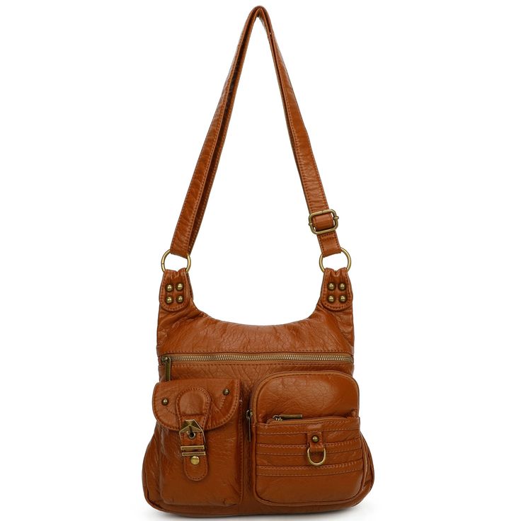 Product Features Made with high quality soft vegan leather, the Emily crossbody is the larger version of our aria crossbody. This bag features brass hardware, 4 exterior pockets, and a back pocket for all you daily essentials Easy access to store all your essentials: 1 zipped closure, 2 exterior pockets, and 1 back nylon zipped pocket Studded stones to give the bag more contrast Dimension: 8" L x 9" H x 3" W Polyester lining Adjustable straps up to 24 inches Soft-vegan leather Brass toned/silver Faux Leather Crossbody Satchel With Metal Hardware, Casual Faux Leather Shoulder Bag With Pockets, Casual Shoulder Bag With Metal Hardware, Faux Leather Shoulder Bag With Metal Hardware For Travel, Travel Satchel With Metal Hardware And Faux Leather, Casual Shoulder Bag With Metal Hardware For Daily Use, Crossbody Hobo Bag With Metal Hardware For Daily Use, Casual Soft Leather Crossbody Hobo Bag, Casual Soft Leather Hobo Crossbody Bag