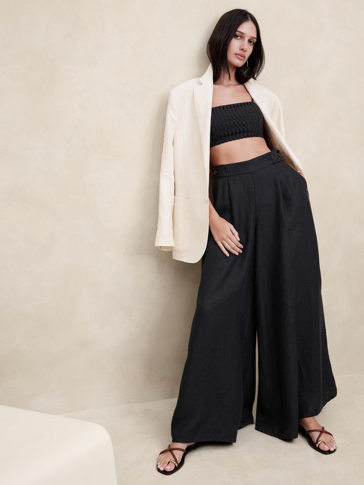 Effortlessly cool with an ultra high waist, this wide-leg pant employs certified European linen to stay fresh and crisp as temperatures rise.  Here, we dialed up the volume to create a super-wide leg silhouette that creates dynamic movement with every step.  Ultra-high rise (11").  Extra wide leg.  Full length.  Invisible zip at back.  Side pockets.  Iced Vanilla: Fully lined.  All other colors: Unlined.  Ultra-high rise (11").  Extra wide leg.  Full length.  Inseams: Petite 28. 5", Regular 30. Black Linen Pants, Wide Leg Linen Pants, Banana Republic Women, Stay Fresh, Banana Republic Pants, Pantalon Large, Bottom Clothes, Linen Pants, Wide Leg Trousers