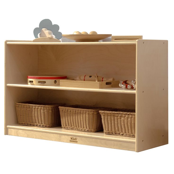 a wooden shelf with baskets and toys on it