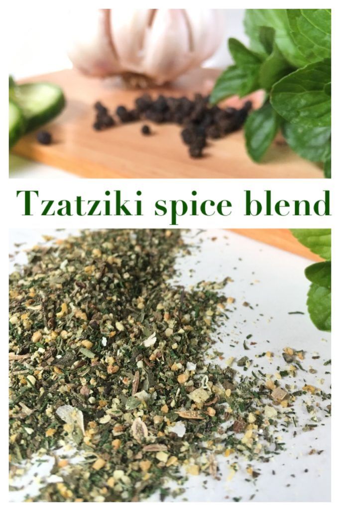 the ingredients to make tazaki spice blend on a cutting board with basil leaves and cucumbers