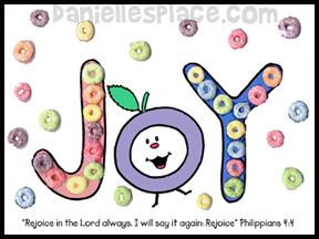 the word joy is made up of colorful buttons and sprinkles with a smiling face