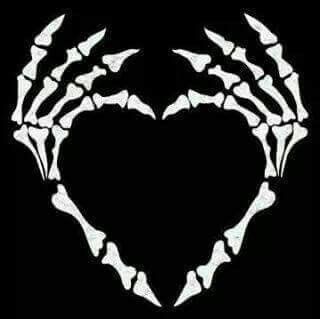 a heart made out of bones on a black background