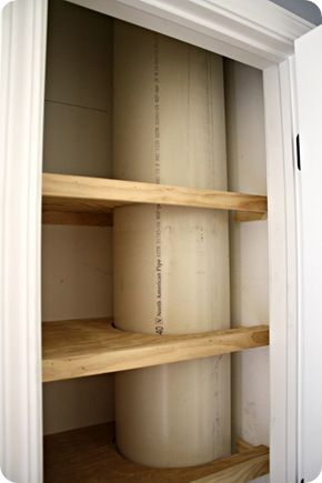 an empty pantry with several rolls of toilet paper in it