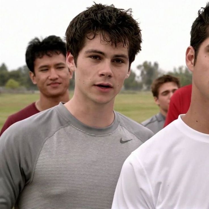 a group of young men standing next to each other