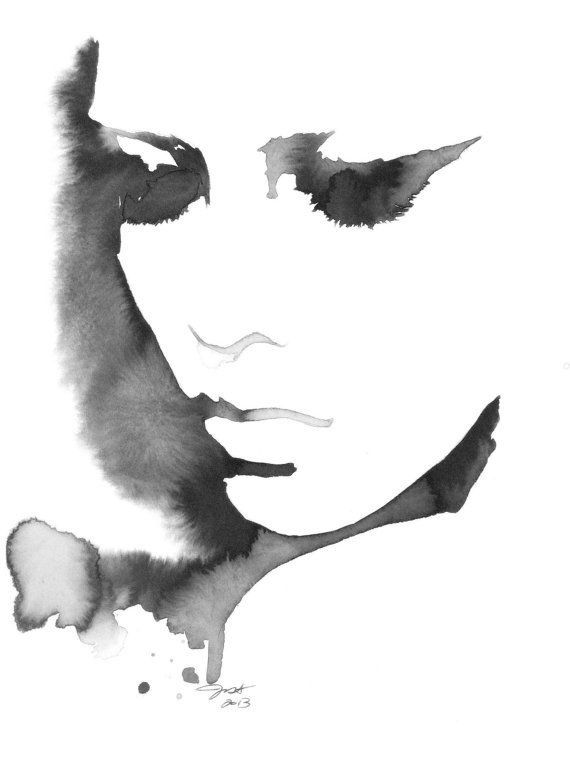 a black and white drawing of a woman's face