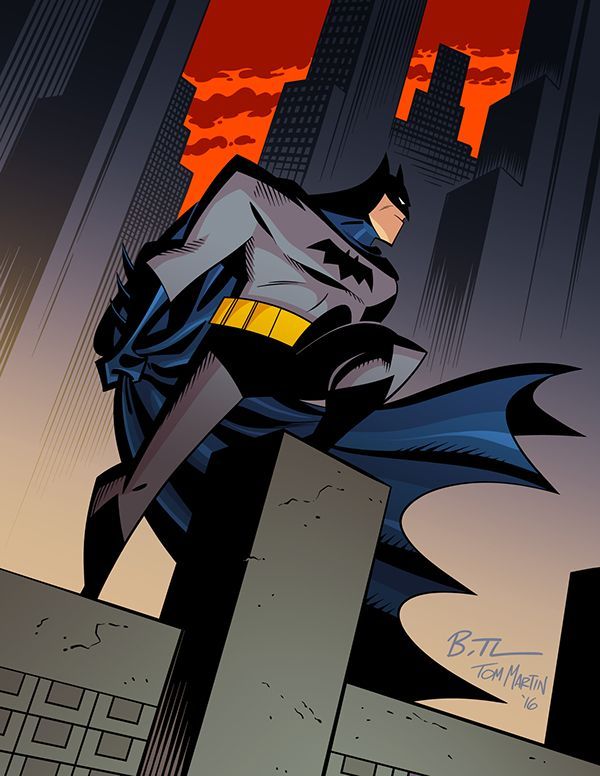 batman standing on top of a building in the city