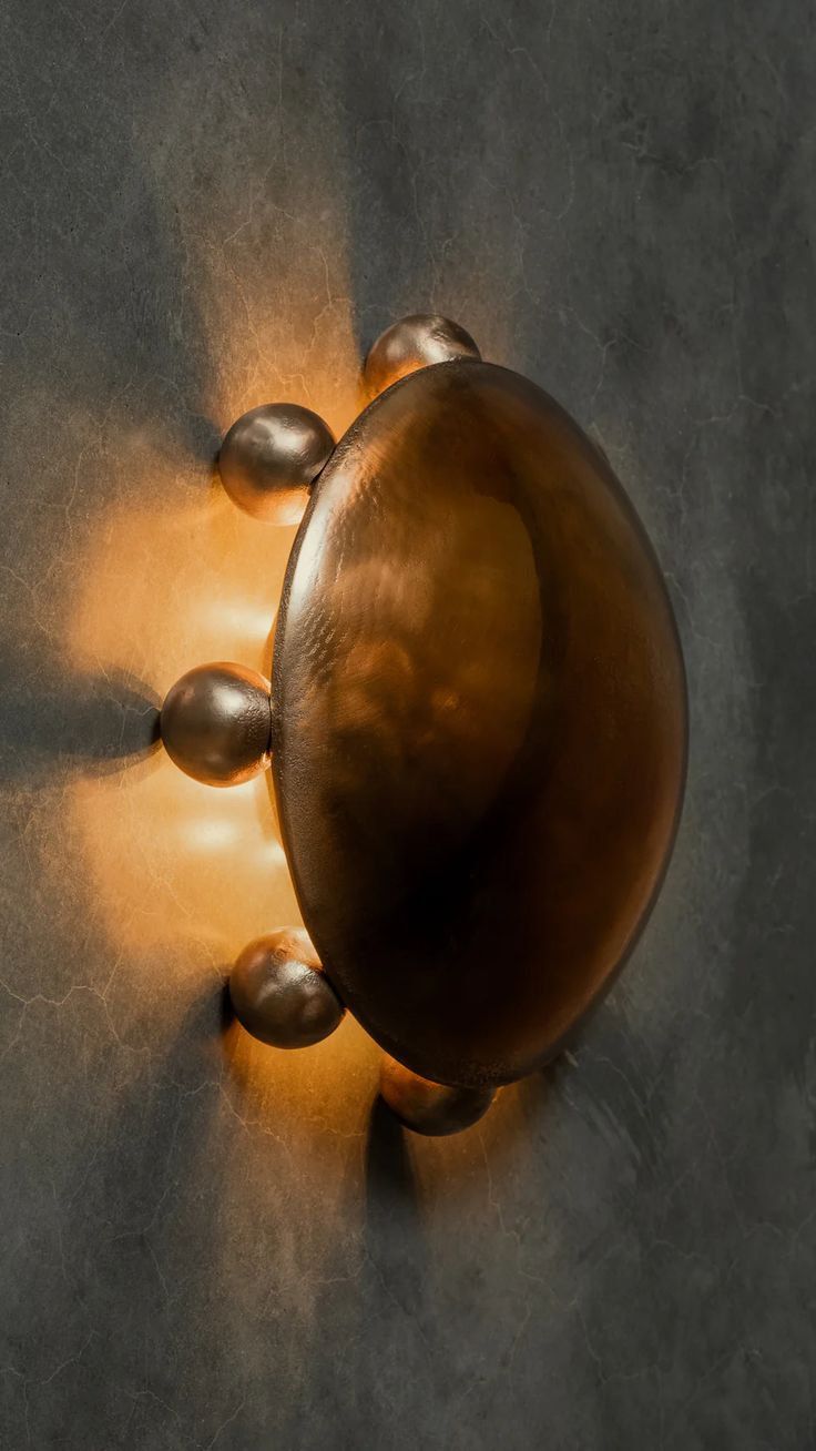 an overhead view of a light fixture on the wall