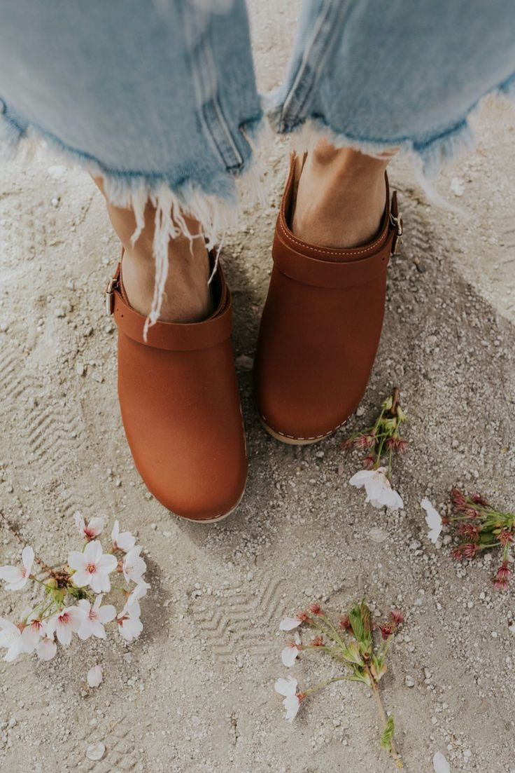 Casual + Cute Clogs for Spring | ROOLEE Boho Wear, Half Slippers, Clogs Outfit, Brown Clogs, Swedish Clogs, New Retro, Denim Skirts, On The Horizon, Plus Size Shopping