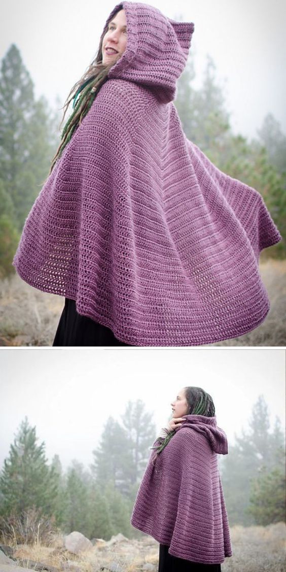 a woman wearing a purple crocheted hooded ponchy in front of some trees