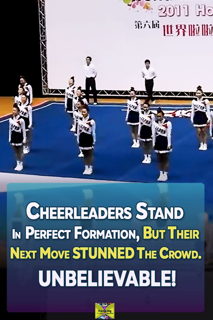 cheerleaders stand in perfect formation, but their next move turned the crowd unbelievablely