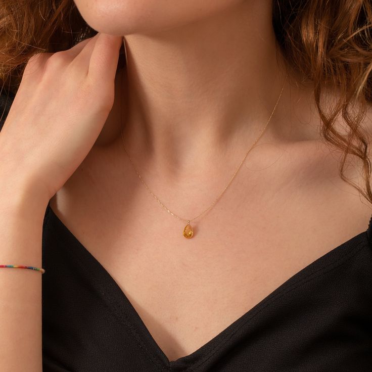 "14K Real Gold Teardrop Birthstone Necklace, Pear Shaped Cubic Zirconia Dainty Necklace for Women, Everyday Necklace, Perfect Bridesmaid Gift 📘 D E T A I L S * Solid Gold (real gold, no gold-filled or no gold plated material) * Karat: 14K (585) * Gold color: Yellow * Height of teardrop: 9.50 mm * Width of teardrop: 6.0 mm * Available chain thickness: 0.72 mm Measurements may vary slightly due to handwork. ┈ C H A I N L E N G T H O P T I O N S * 14\" choker size (No adjustable option) * 14-16\" Gold Briolette Birthstone Necklace In 14k Gold, Gold Briolette Birthstone Necklace In Fine Jewelry Style, Gold Briolette Birthstone Necklace Fine Jewelry, Dainty Gold-plated Round Birthstone Necklace, Gold Briolette Birthstone Necklace, Dainty Diamond Necklace With Pearl Pendant For Gift, Teardrop Gold Plated Birthstone Necklace, Gold Plated Teardrop Birthstone Necklace, Gold-plated Birthstone Teardrop Necklace