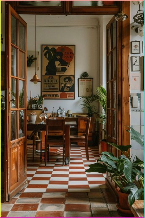 a dining room filled with lots of furniture and potted plants on top of a checkered floor