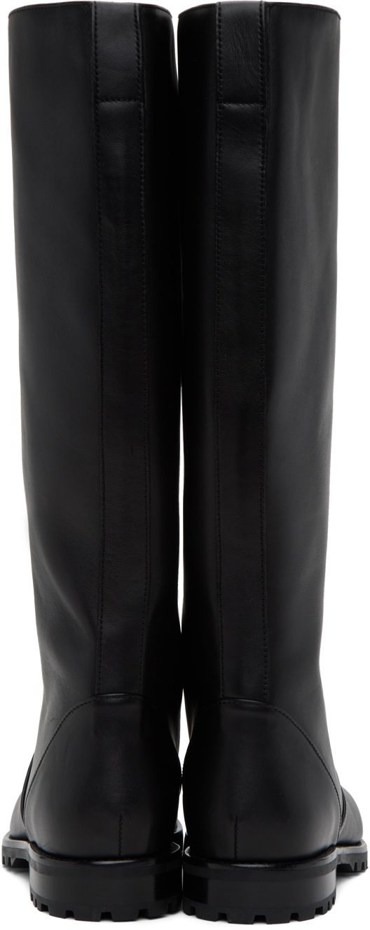 Handcrafted knee-high buffed calfskin boots in black. · Pull-loop at heel collar · Crinkled leather lining · Stacked leather heel · Treaded rubber sole Supplier color: Black Luxury Black Mid-calf Boots, Luxury Calf Leather Knee-high Boots For Business, Luxury Knee-high Boots With Leather Sole For Business, Luxury Knee-high Calf Leather Boots With Leather Sole, Luxury Knee-high Calf Leather Boots, Formal Wide Calf Mid-calf Heeled Boots, Black Calf Leather Knee-high Boots With Leather Sole, Leather Knee-high Platform Boots With Sculpted Heel, Luxury Calf Leather Knee-high Boots