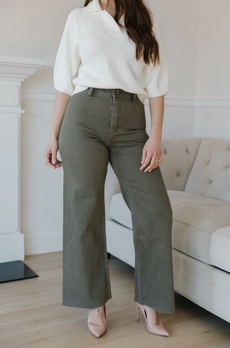 The Olive Green Wide Leg Jeans are an essential addition to any wardrobe. These classic jeans feature a flattering high waist, wide leg fit, and cropped style that flatters your figure and ensures comfort and flexibility throughout the day. Perfect for all seasons, these jeans provide timeless elegance and style. olive green wide leg pants high waist comfort stretch raw hem 98% cotton 2% spandex machine wash cold model is wearing a small SIZING CHART FOR THE JEANS: Small: fits sizing 25-26 Mediu Olive Wide Leg Pants, Green Wide Leg Jeans, Curvy Date Night Outfit, Green Wide Leg Pants, Air Clothes, Olive Green Jeans, Valentines Day Dresses, Pants Green, Green Jeans