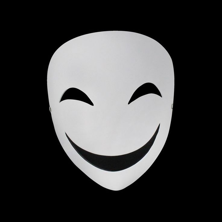 a white mask with black eyes and smiling faces on it's face in the dark