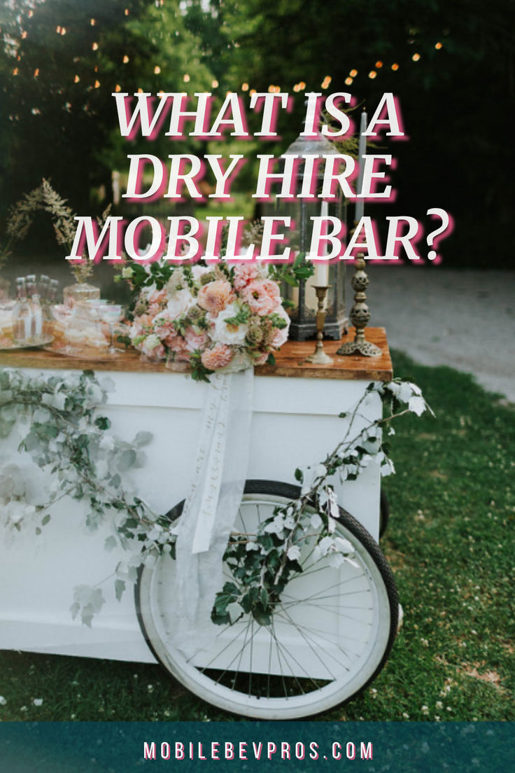 a bike parked next to a table with flowers on it and the words what is a dry hire mobile bar?