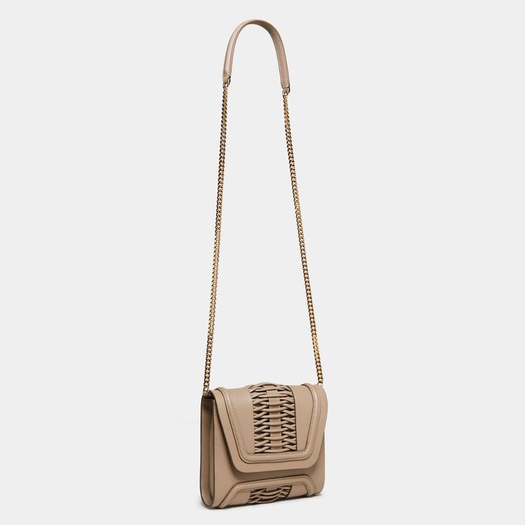 This Mini Giovanna leather clutch balances immaculate tailoring with discreet elegance. Featuring a classic handcrafted braided detailing, and structured frame. A timeless statement that you can wear as a cross-body bag or clutch-style. Nappa soft calfskin Gold hardware Magnetic flap closure Detachable chain crossbody strap, 21.5’’ (54,6 cm) Drop Internal zipped pocket Internal YY logo plaque Ultrasuede lining Height: 6.5'' (16,5cm) Width: 7.5'' (19cm) Depth: 2'' (5cm) Imported. Made in Europe A Elegant Beige Woven Leather Bags, Elegant Beige Woven Leather Shoulder Bag, Evening Leather Clutch With Braided Handles, Leather Clutch With Braided Handles For Evening, Elegant Woven Leather Clutch For Evening, Elegant Evening Clutch With Woven Leather, Elegant Woven Leather Evening Clutch, Elegant Formal Bag With Woven Leather, Elegant Woven Leather Bag For Formal Occasions