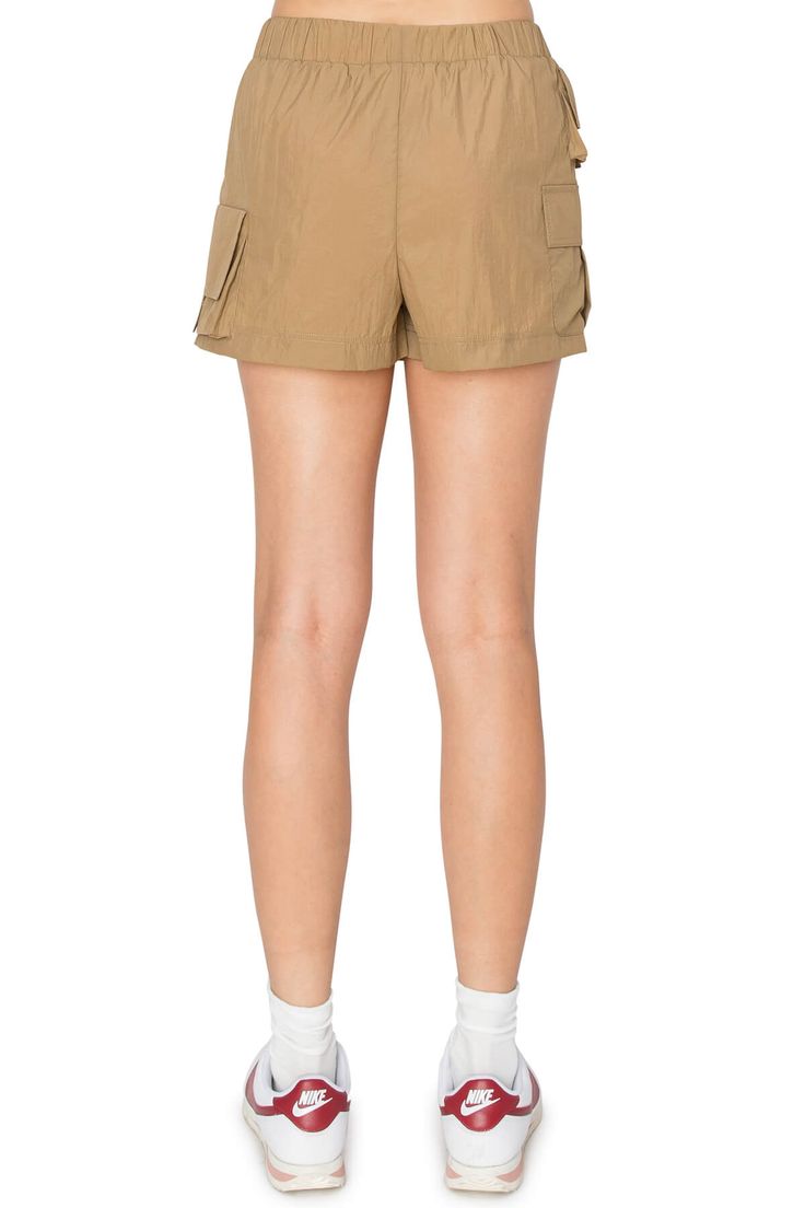 100% Rayon Feature: This workwear-inspired skirt sits low on the waist features side cargo pockets and side hand pockets. This mini skirt the perfect choice for a daily wear, weekend trips, date nights, and more. Versatile Style: Pair these with a crop tee, oversized t-shirt and sneakers for a casual everyday sporty look or layer with hoodies and sweaters. Style it with your favorite camisole tanks and sandals in spring and summer. Occasion: Perfect for a variety of occasions and settings, this High Waist Cargo Skirt With Cargo Pockets For Work, High Waist Cargo Skirt For Work, High-waisted Cargo Skirt For Workwear, Utility Mini Skort With Pockets, High Waist Shorts With Side Pockets For Work, Utility High Waist Mini Skirt With Pockets, Utility Style Mini Cargo Skirt With Multiple Pockets, Utility Mini Cargo Skirt With Multiple Pockets, Utility Mini Skort With Patch Pockets