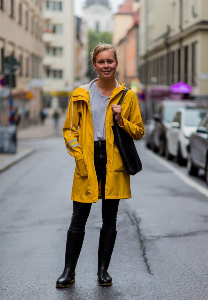 Go Big and Pair Your Yellow Raincoat With Wellies Yellow Raincoat Outfit, Rain Jacket Outfit, Rainy Outfit, Yellow Rain Jacket, Rain Outfit, Raincoat Outfit, Colorful Wardrobe, Rainwear Fashion, Wardrobe Capsule