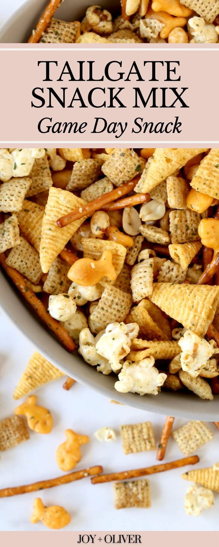 tailgate snack mix in a bowl with crackers on the side and text overlay that reads tailgate snack mix game day snack