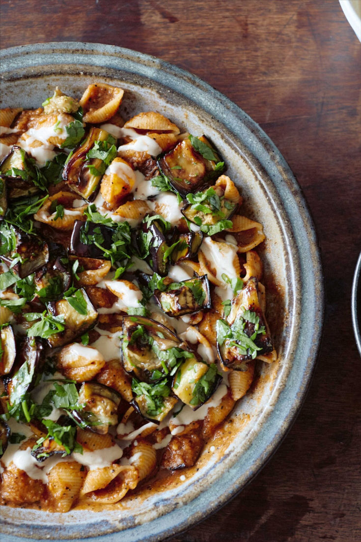 a pizza sitting on top of a pan covered in toppings