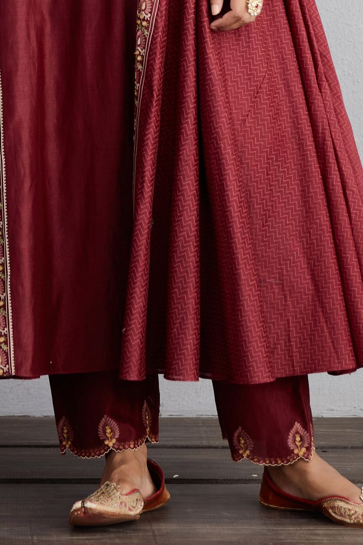 Garnet red flared long kurta with all-over aari worked motifs and side panels. Comes with handwoven chanderi pants and scallop border dupatta.
Component: 3
Embroidered
Neckline: Round
Sleeve Length: Full
Fabric: Kurta and Pant: Handwoven Chanderi and Cotton Voile; Dupatta: Handwoven Chanderi
Color: Red
Side panels
Churidar sleeves
Scallop cutwork - Aza Fashions Churidar Sleeves, Red Kurta, Scallop Border, Long Kurta, Red Flare, Garnet Red, Embroidered Neckline, Churidar, Cotton Voile