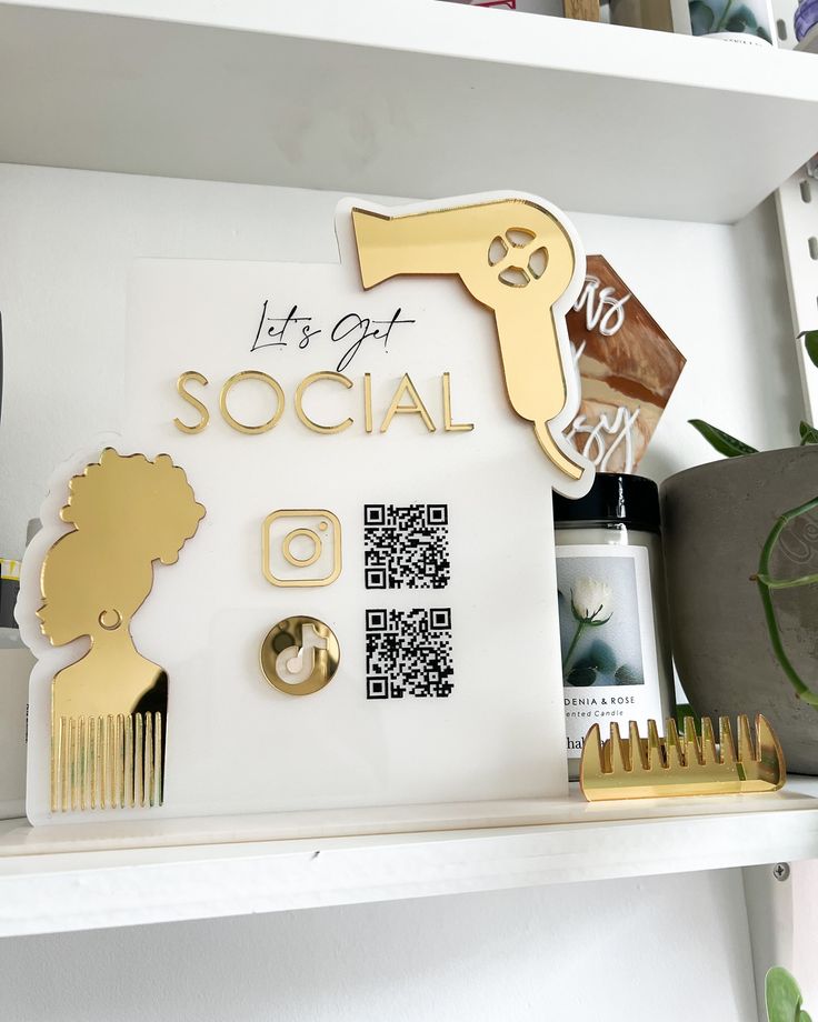 there is a sign that says let's get social on the shelf next to it