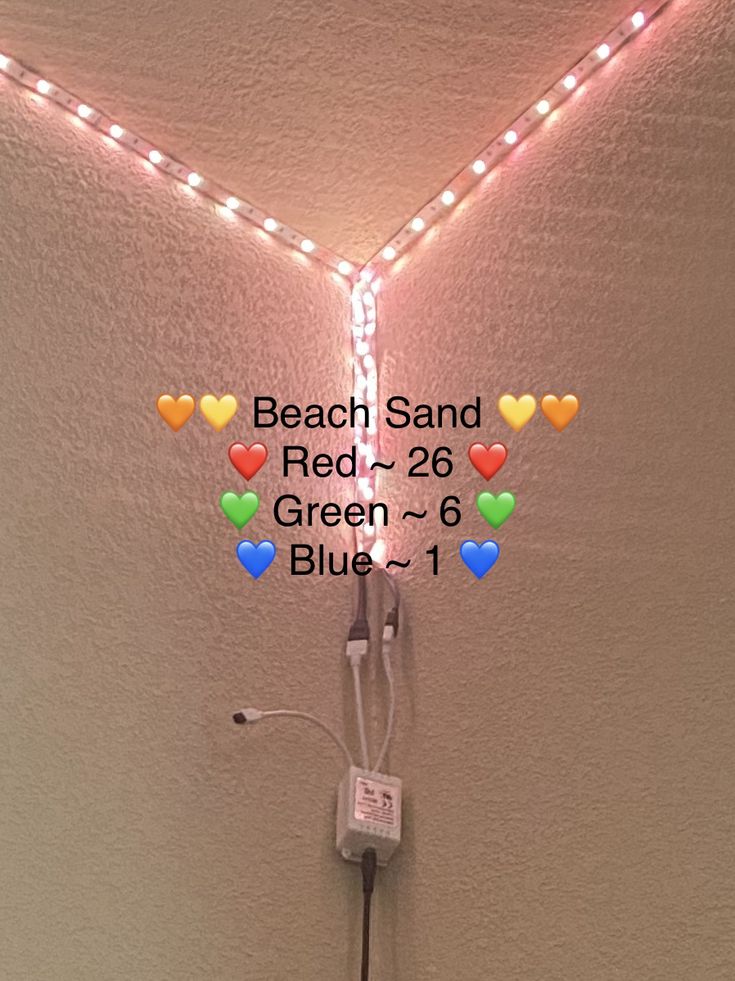 a heart shaped sign with the words beach sand red, 26 green, 6 blue and 1