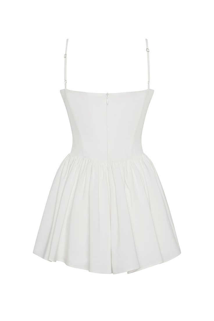 Discover the epitome of femininity in our Bellini Bustier Mini Dress. This classic, white mini dress is complimented with wire bustier cups, side pockets and cinching waistline which effortless skims down the body to a flared skirt hemline. The mini length makes it a fun and flirty dress perfect for any summer occasion! Perfer midi length? Try our "Ballerina Dress" - same style, just in midi length. Bustier Mini Dress, High Waist Long Skirt, Long Skirt Outfits, Ballerina Dress, Plain Dress, Bodycon Floral Dress, Trendy Dress, Flirty Dresses, Bustier Dress