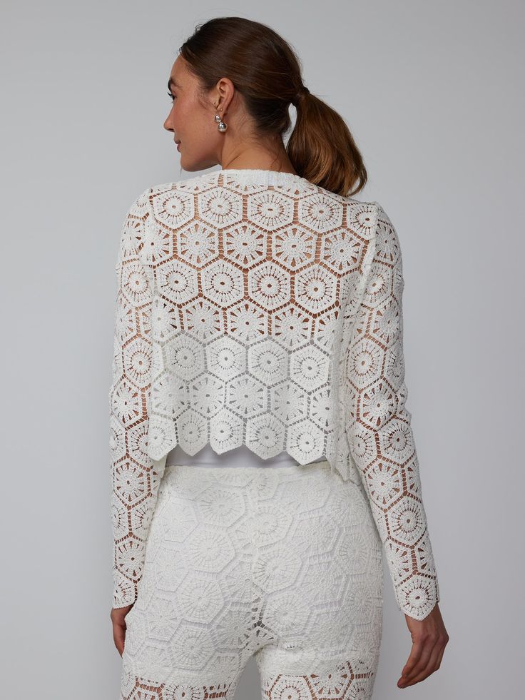 Vibe in pure fashion with this gorgeous crochet jacket. It features a polished round neck along with long sleeves. With one hook for closure and an open front design, this jacket blends trends and classic style perfectly. Elegant Long Sleeve Crochet Top For Spring, Elegant Open Knit Long Sleeve Cardigan, Elegant Long Sleeve Open Knit Cardigan, Elegant Fall Crochet Top, Elegant Open Knit Outerwear For Spring, Elegant Spring Open Knit Outerwear, Chic Lace Cardigan, Elegant Open Knit Crochet Top For Spring, Fitted Long Sleeve Cardigan With Crochet Lace