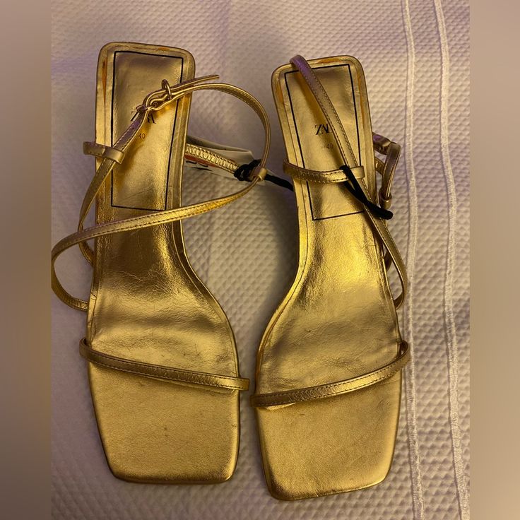 New Zara Gold Heels. Tags On . Has Some Minor Scuffs Probably From Moving Them Around That’s Why Selling Cheaper. Heel 3” Fits Size 9 Up To 10 Gold Square Toe Sandals For Evening, Chic Gold Square Toe Sandals, Gold Square Toe Evening Sandals, Gold Heels With Heel Strap And Square Toe, Gold Square Toe Sandals For Party, Gold Low Heel Sandals For Night Out, Gold Square Toe Heels For Party, Gold Heels With Wrapped Heel And Square Toe, Gold Heels With Square Toe For Party