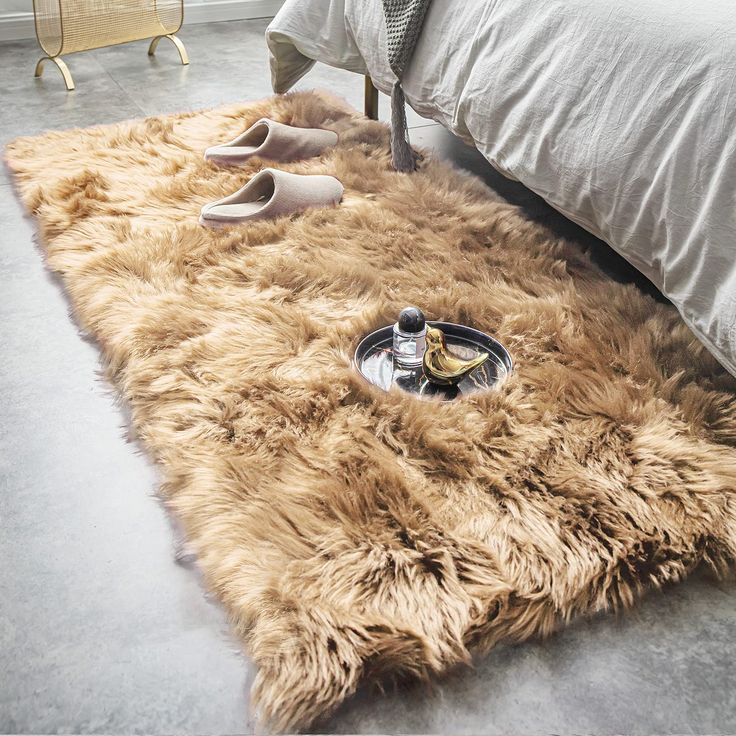 PRICES MAY VARY. ADD STYLE TO ANY ROOM: Please gently shake it for fluffy once unfolds. Ideal as your favorite living room carpet and area rug beside the bed. A must have accent in your home. SIZE: Approx. 60 in. x 84 in. On the fur size, 0.79-Inch-thick pile, reduce footsteps effectively and idea for use in nursery. MATERIAL: Front side: Artificial Animal Wool; Back side: Soft Ivory Suede backing looks like brushed leather. Give your home a touch of luxury. SUPER SOFT AND SHAGGY: Fuzzy and soot Shaggy Carpet, Fuzzy Rug, Faux Fur Area Rug, Faux Sheepskin Rug, Faux Fur Rug, Fur Rug, Take Off Your Shoes, Plush Sofa, Solid Color Rug