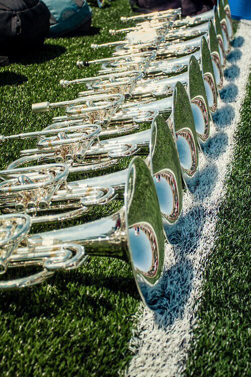 the trophies are lined up on the field to be awarded for their team's victory