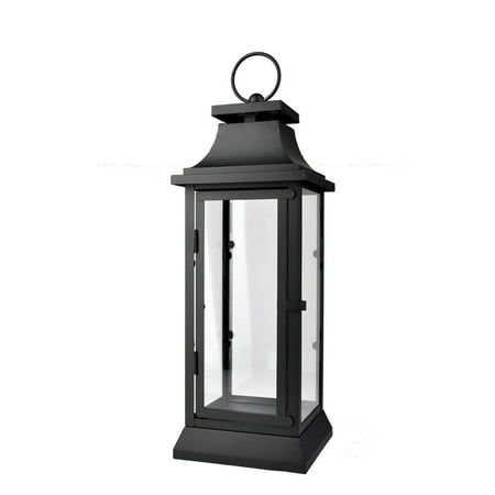 an old fashioned black lantern on a white background