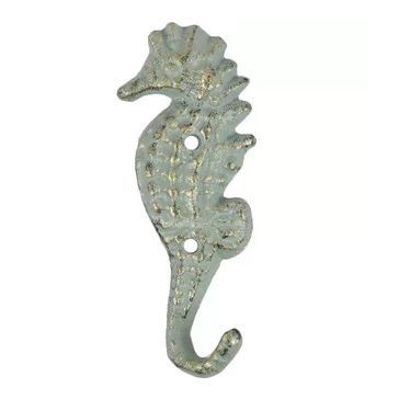 a metal seahorse on a white background