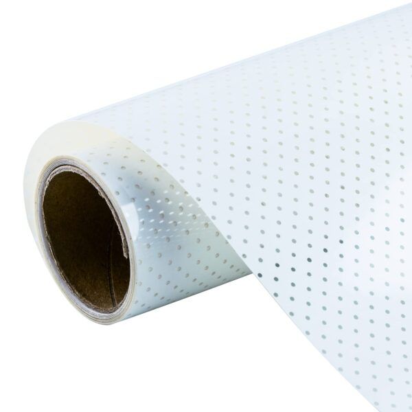 a roll of white perfored paper with holes on it